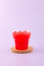 Jus semangka drink in disposable plastic take away cup. Fresh iced Smoothie made from watermelon and melon pulp. Melon and Royalty Free Stock Photo