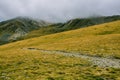 Hiking on a autumn foggy day in the High Pyrenees Mountains Catalonia, Spain Royalty Free Stock Photo