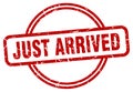 just arrived stamp. just arrived round grunge sign. Royalty Free Stock Photo