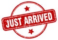 just arrived stamp. just arrived round grunge sign. Royalty Free Stock Photo