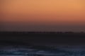 Antelopes crossing white Rann after sunset