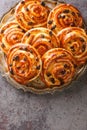 Just baked pain aux raisins buns are also called escargot or pain russe, is a spiral pastry with custard cream and raisin closeup Royalty Free Stock Photo