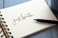 JUST BREATHE hand-lettered in notepad with brush pen Royalty Free Stock Photo