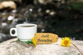 Just breathe text with coffee cup Royalty Free Stock Photo
