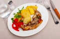 Just cooked portion of grilled lamb leg with potatoes and pepper Royalty Free Stock Photo