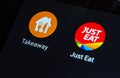 Just Eat app and Takeaway app next to it on the smartphone screen. Conceptual photo for the news about a potentia