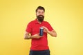 Just fabulous hair. Shampoo for hair type. Make hair stronger. Man cheerful handsome bearded hipster hold bottle shampoo