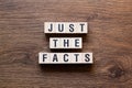 Just the facts - word written on cubes, text Royalty Free Stock Photo