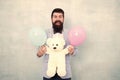 Just happy. gift with love. Stereotypical presents. Romantic man with teddy bear and party balloon. surprise for his Royalty Free Stock Photo