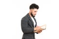 Just Inspired. Thoughtful Young Man In Suit Making Notes In His Pad Royalty Free Stock Photo