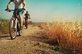 Just keep pedaling. two cyclists out cycling in the countryside. Royalty Free Stock Photo