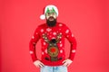Just look at that. unhappy santa ready to celebrate xmas. its time for christmas. man reindeer on knitted sweater