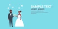 Just married african american couple standing together bride and groom holding champagne glasses wedding day concept