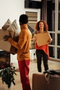 Just married couple feeling excited while moving to their first home