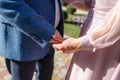 Just married couple holding hands , close-up Royalty Free Stock Photo
