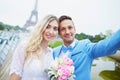 Just married couple near the Eiffel tower in Paris Royalty Free Stock Photo