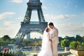 Just married couple in Paris near the Eiffel tower Royalty Free Stock Photo