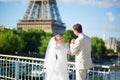 Just married couple in Paris near the Eiffel tower Royalty Free Stock Photo