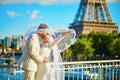 Just married couple in Paris near the Eiffel tower Royalty Free Stock Photo