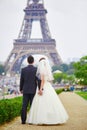 Just married couple in Paris near the Eiffel tower Royalty Free Stock Photo