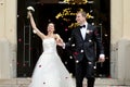 Just married couple under a rain of petals Royalty Free Stock Photo