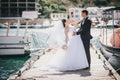 Just married couple walking in small cove Royalty Free Stock Photo