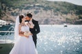 Just married couple walking in small cove Royalty Free Stock Photo