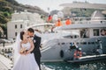 Just married couple walking in small cove Royalty Free Stock Photo