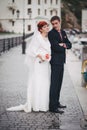 Just married couple walking in small cove Royalty Free Stock Photo