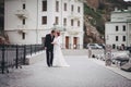 Just married couple walking in small cove Royalty Free Stock Photo
