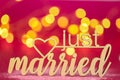 just married inscription on a pink fuchsia background .wedding symbol.Holiday of love and family