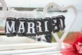 Just married note hanging from the car seat Royalty Free Stock Photo