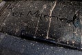 Just married scribed by hand on the back of a muddy car on a sun Royalty Free Stock Photo