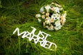 Just married sign with bouquet of roses Royalty Free Stock Photo