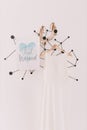 Just married sign with wedding dress and shoes on white wall background Royalty Free Stock Photo