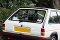 Just married written on back of classic white wedding day car with love heart back window. Royalty Free Stock Photo