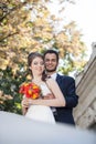 Just married young husband and wife posing in wedding photo Royalty Free Stock Photo