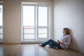 Young woman having a drink in her brand new modern apartment Royalty Free Stock Photo