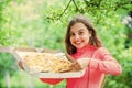 Just one slice. her favorite food. junk food concept. happy child hold big pizza. meal delivery in time. hungry kid Royalty Free Stock Photo