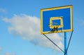 Just painted new colorful backboard and basketball hoop against Royalty Free Stock Photo