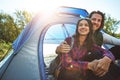 This is just the perfect getaway. an adventurous young couple at their campsite.