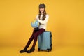 just relax. stylish kid ready for trip. wanderlust. teenage girl with globe. happy childhood