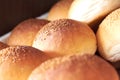 Just roll with it. Closeup shot of a selection of freshly-baked rolls.