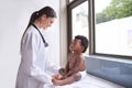 Just in for a routine pediatric checkup. a female pediatrician doing a checkup on an adorable baby boy. Royalty Free Stock Photo