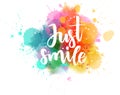 Just smile lettering on watercolor splash Royalty Free Stock Photo