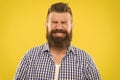 Just sneezed. Man bearded hipster with sneezing face closed eyes close up yellow background. Brutal hipster sneezing Royalty Free Stock Photo