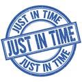 JUST IN TIME written word on blue stamp sign Royalty Free Stock Photo