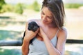 Just too adorable for words. A young woman holding a cute piglet. Royalty Free Stock Photo