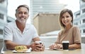 Just two business partners enjoying a meeting over lunch. Portrait of two businesspeople having lunch together outside Royalty Free Stock Photo