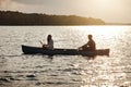 Just the two of us on the lake today. a young couple rowing a boat out on the lake. Royalty Free Stock Photo